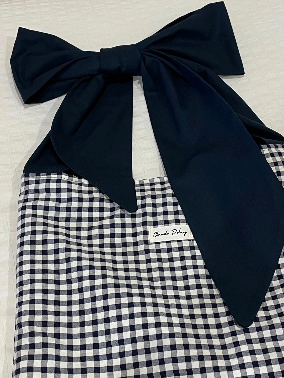 Bolso vichy azul marino con lazada